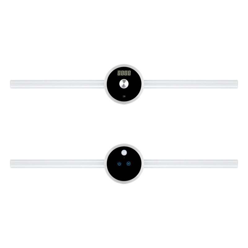 White digital fitness tracker with black display on a white background