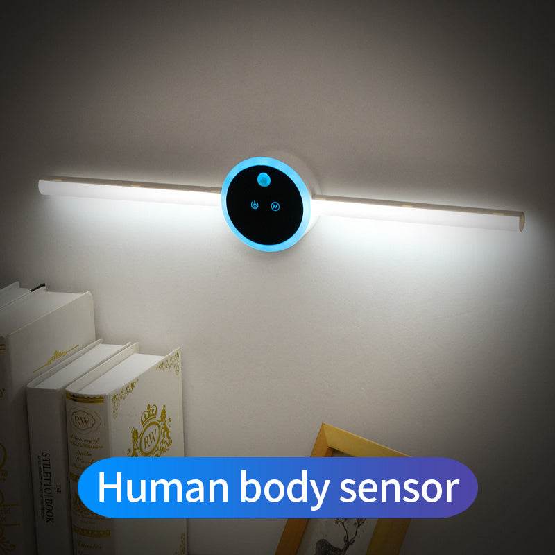 Wall-mounted light fixture with human body sensor label on a neutral background