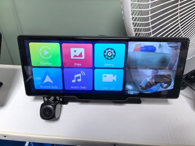 Multifunctional display with app icons and camera on a desk